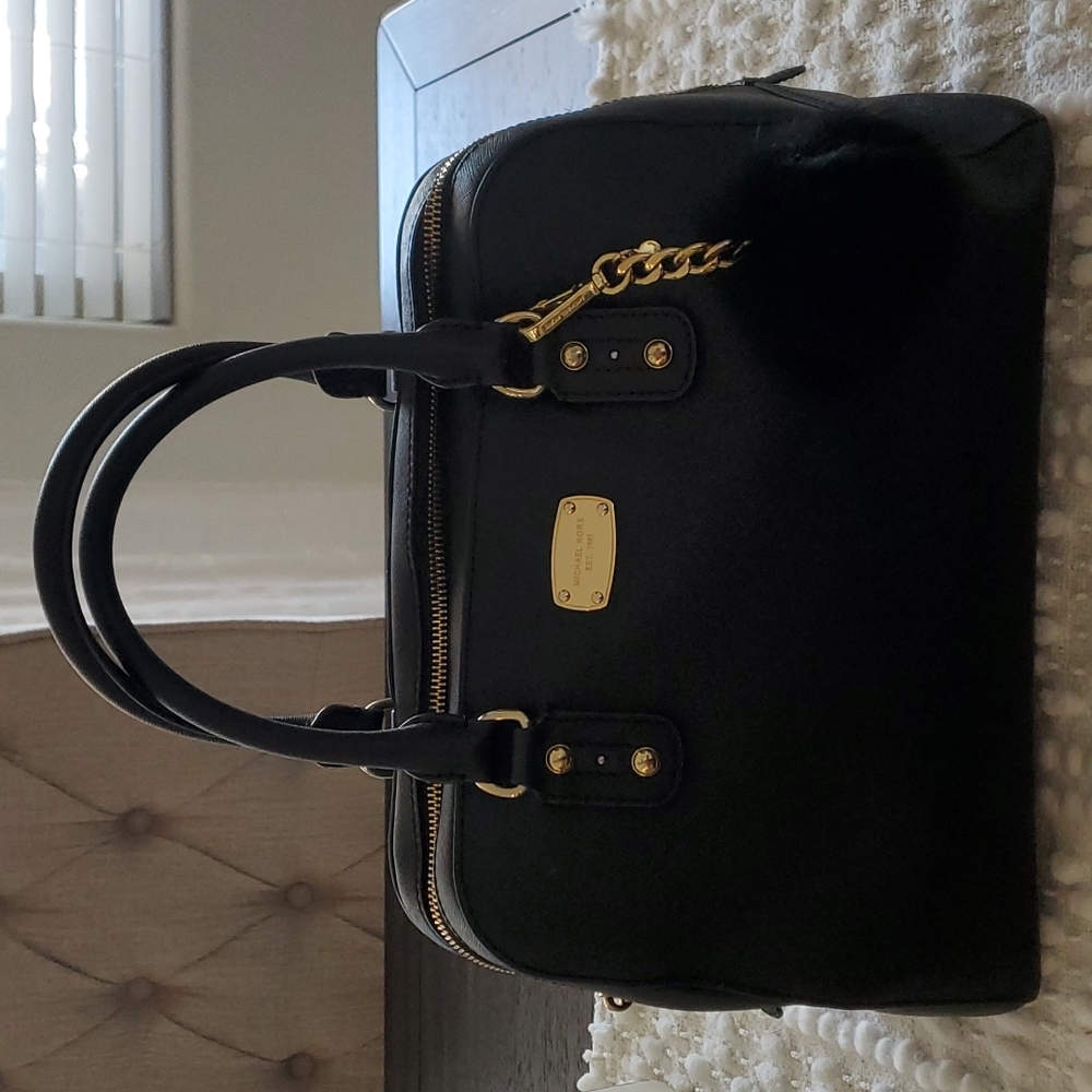Black Michael Kors doctor bag with key chain